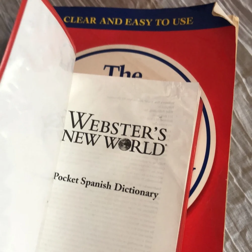 MERRIAM WEBSTER DICTIONARY & POCKET SPANISH DICTIONARY lot of 2 paperback books